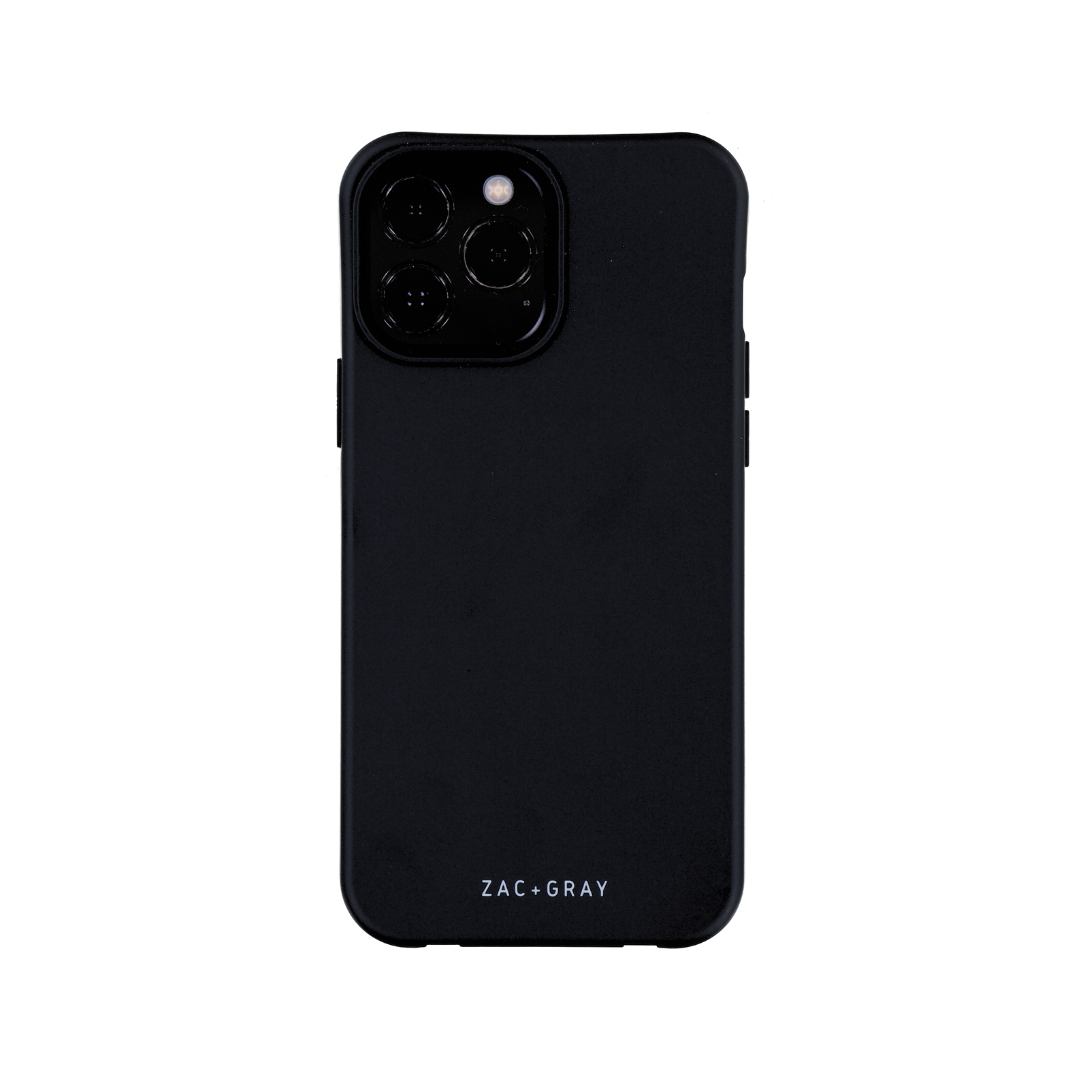 a black iphone case sitting on top of a white surface