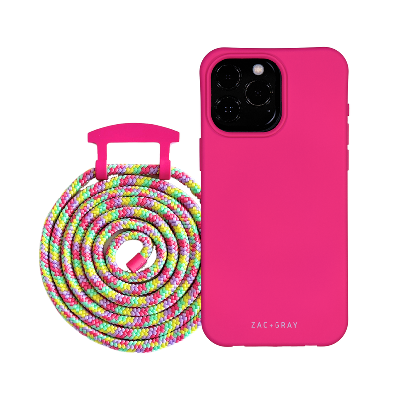 a pink phone case next to a colorful rope